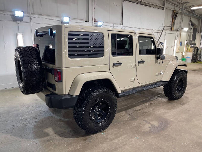 Used 2016 Jeep Wrangler Unlimited Sahara with VIN 1C4HJWEG6GL290827 for sale in Sioux Falls, SD