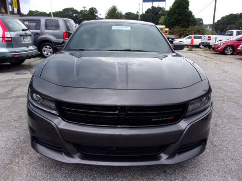 2015 Dodge Charger for sale at King of Auto in Stone Mountain GA