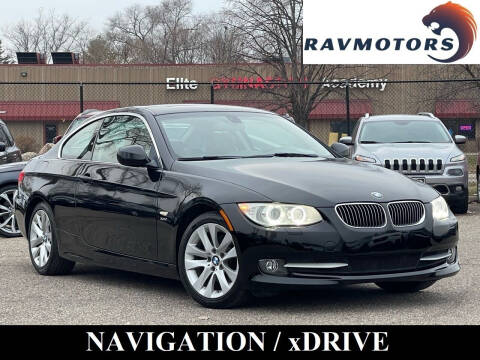 2011 BMW 3 Series for sale at RAVMOTORS- Burnsville in Burnsville MN