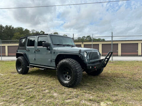 2014 Jeep Wrangler Unlimited for sale at Showtime Rides in Inverness FL