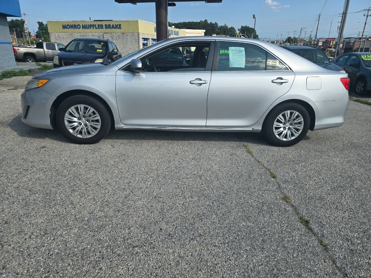 2012 Toyota Camry for sale at QUEENSGATE AUTO SALES in York, PA