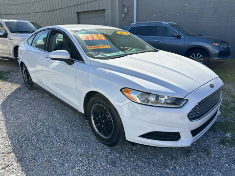 2014 Ford Fusion for sale at CHEAPIE AUTO SALES INC in Metairie LA