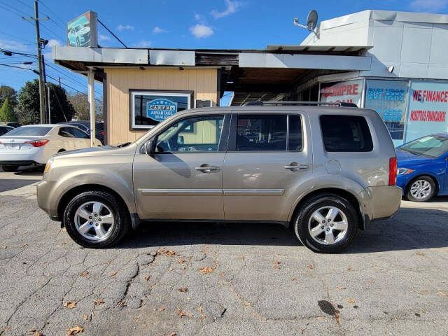 2011 Honda Pilot for sale at DAGO'S AUTO SALES LLC in Dalton, GA