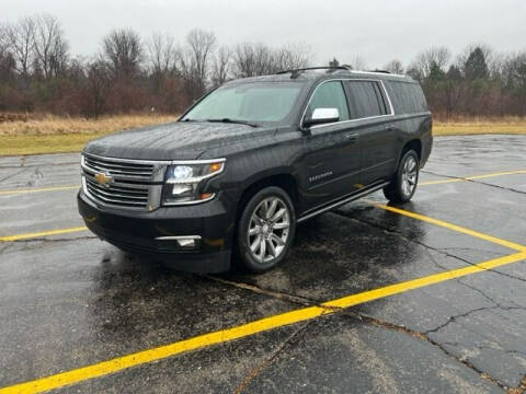 2017 Chevrolet Suburban for sale at Caruzin Motors in Flint MI