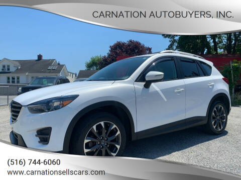2016 Mazda CX-5 for sale at CarNation AUTOBUYERS Inc. in Rockville Centre NY