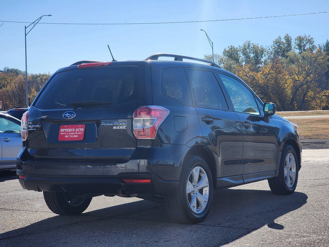 2015 Subaru Forester for sale at Optimus Auto in Omaha, NE