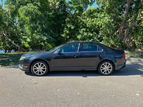 2012 Ford Fusion for sale at Family Auto Sales llc in Fenton MI