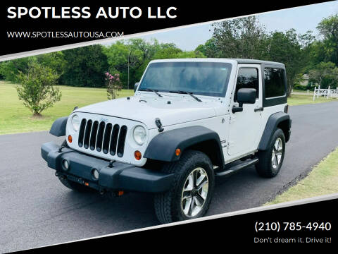 2011 Jeep Wrangler for sale at SPOTLESS AUTO LLC in San Antonio TX