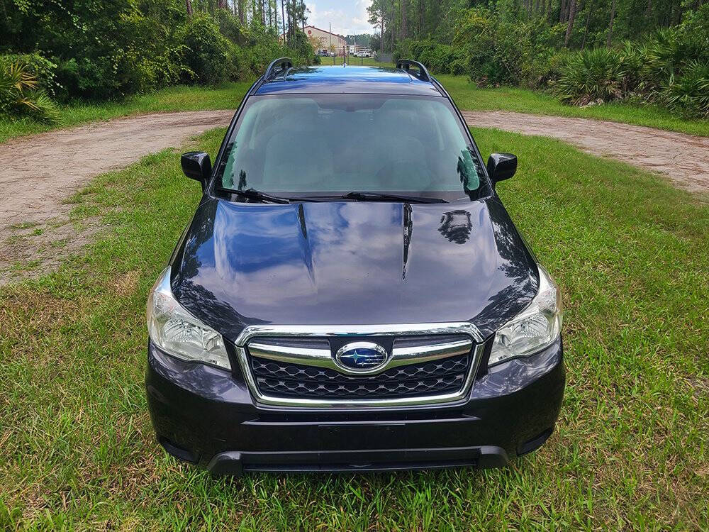 2014 Subaru Forester for sale at Flagler Auto Center in Bunnell, FL