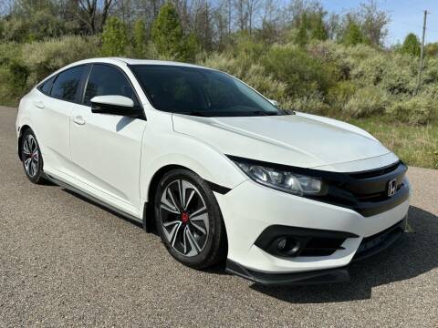 2016 Honda Civic for sale at Jim's Hometown Auto Sales LLC in Cambridge OH