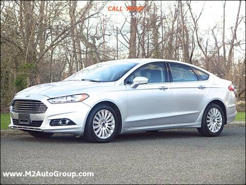 2014 Ford Fusion Hybrid for sale at M2 Auto Group Llc. EAST BRUNSWICK in East Brunswick NJ