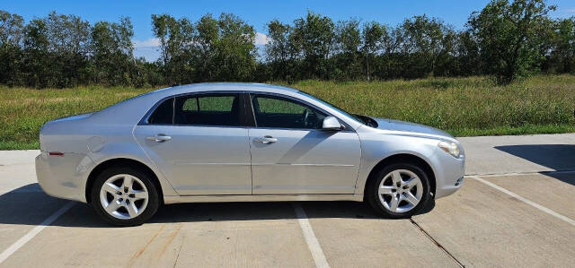 2010 Chevrolet Malibu for sale at CAR MARKET AUTO GROUP in Sugar Land, TX