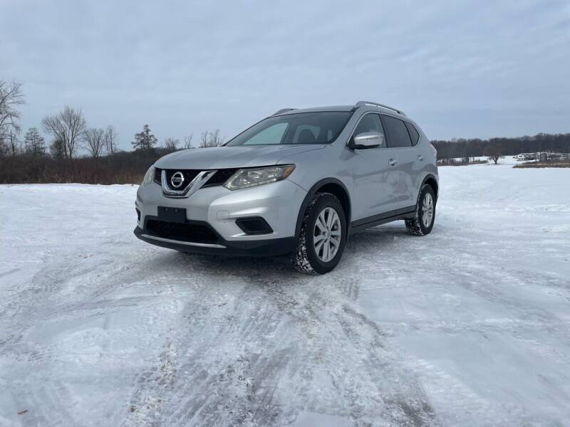 2015 Nissan Rogue for sale at Rombaugh's Auto Sales in Battle Creek MI