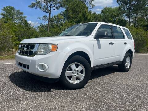 2012 Ford Escape for sale at VICTORY LANE AUTO SALES in Port Richey FL