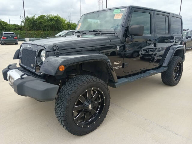 2014 Jeep Wrangler Unlimited for sale at Auto Haus Imports in Grand Prairie, TX