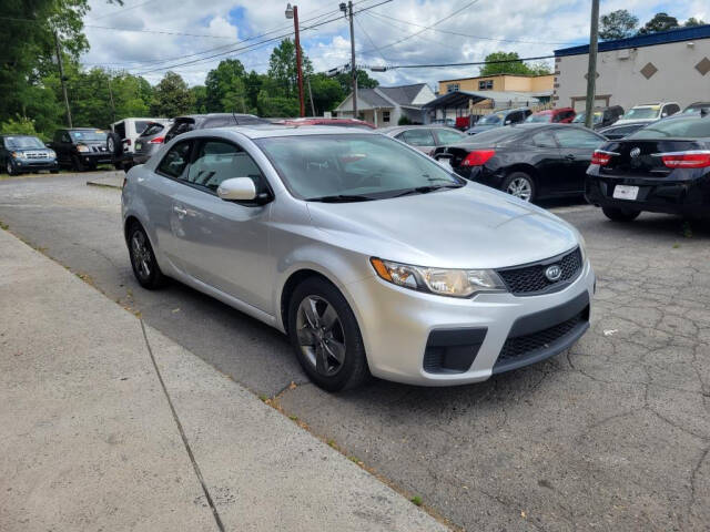 2010 Kia Forte Koup for sale at DAGO'S AUTO SALES LLC in Dalton, GA