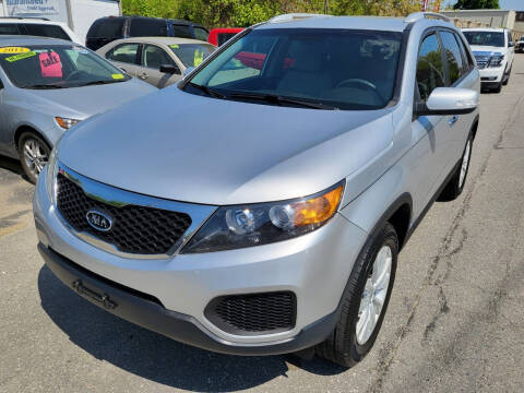 2011 Kia Sorento for sale at Howe's Auto Sales in Lowell MA