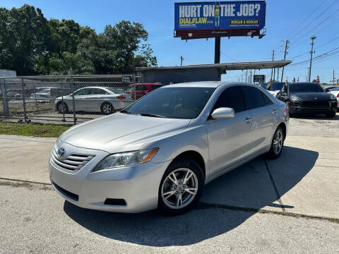 2009 Toyota Camry for sale at P J Auto Trading Inc in Orlando FL