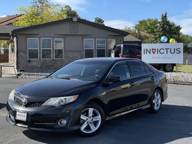 2014 Toyota Camry for sale at INVICTUS MOTOR COMPANY in West Valley City UT