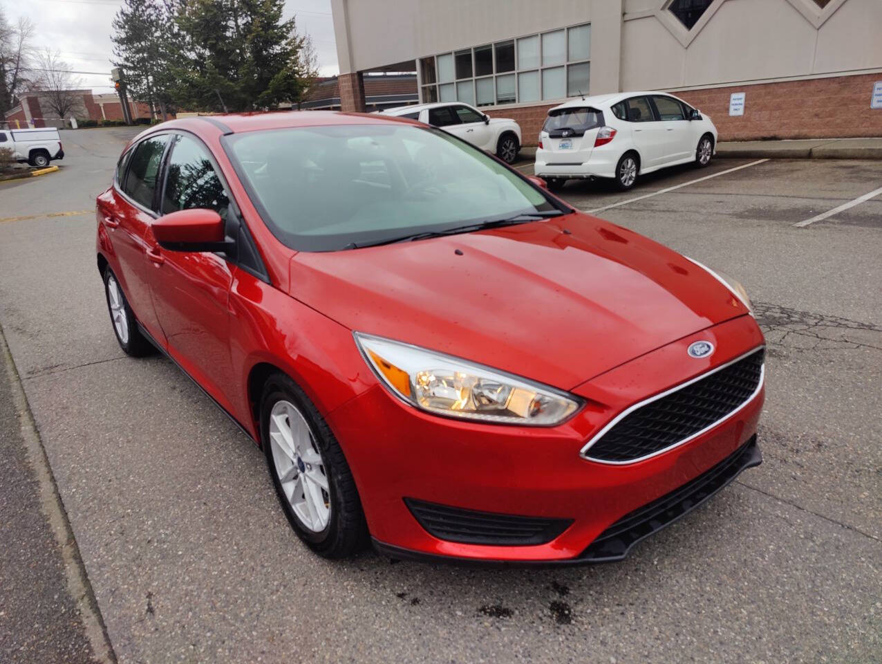 Hot Pepper Red Metallic Clearcoat 2018 Ford Focus SE SE 4dr Hatchback 1