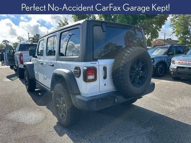 Used 2021 Jeep Wrangler Unlimited Willys Sport with VIN 1C4HJXDN6MW856372 for sale in Lighthouse Point, FL
