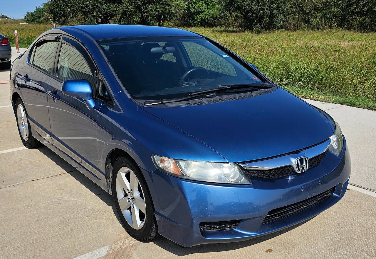 2011 Honda Civic for sale at CAR MARKET AUTO GROUP in Sugar Land, TX