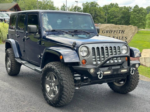 2012 Jeep Wrangler Unlimited for sale at Griffith Auto Sales LLC in Home PA