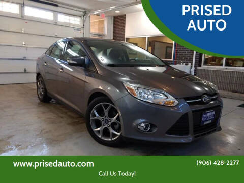 2014 Ford Focus for sale at PRISED AUTO in Gladstone MI