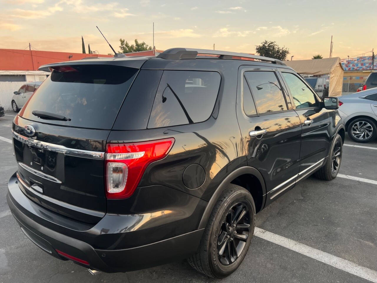 2015 Ford Explorer for sale at Unique Auto Sales, Inc. in Bell, CA