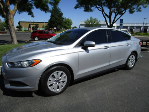 2013 Ford Fusion for sale at KM MOTOR CARS in Modesto CA