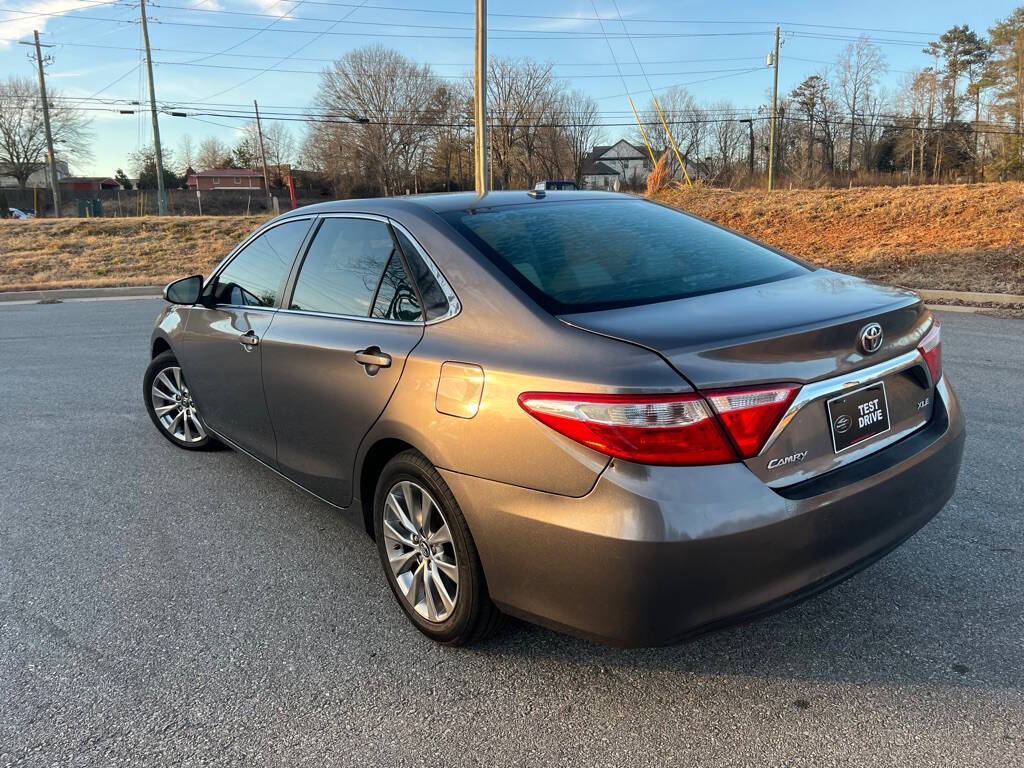 2015 Toyota Camry for sale at Khanz Luxury Motors in Buford, GA