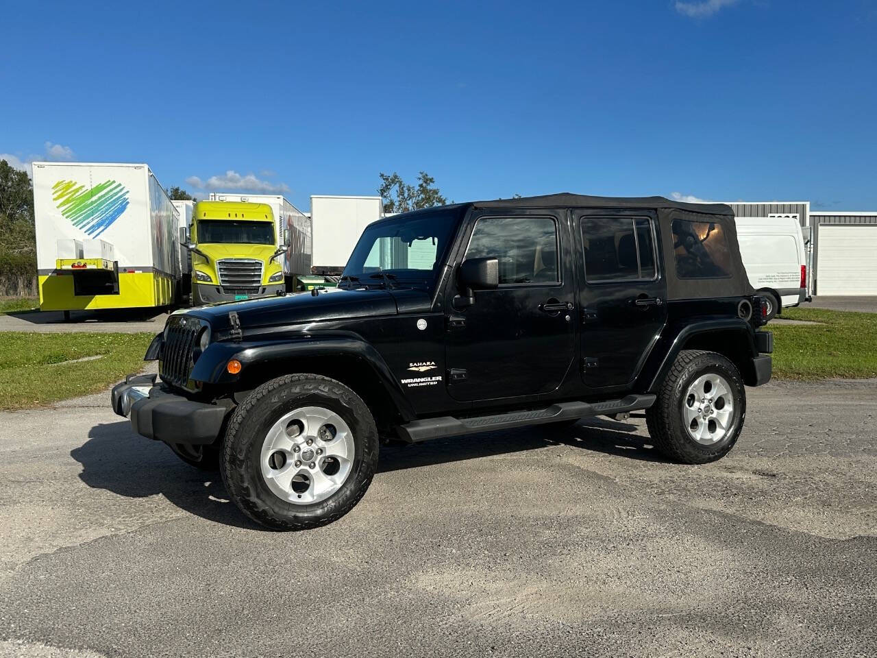 2013 Jeep Wrangler Unlimited for sale at Rubi Motorsports in Sarasota, FL