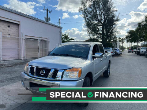 2011 Nissan Titan for sale at UNITED AUTO BROKERS in Hollywood FL