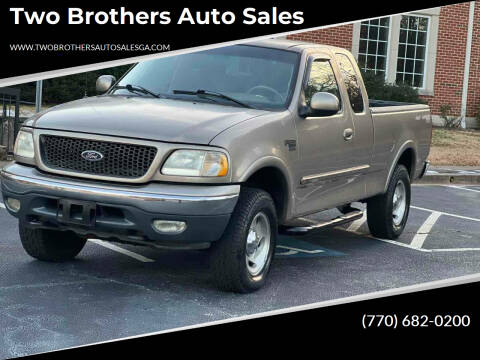 2001 Ford F-150 for sale at Two Brothers Auto Sales in Loganville GA