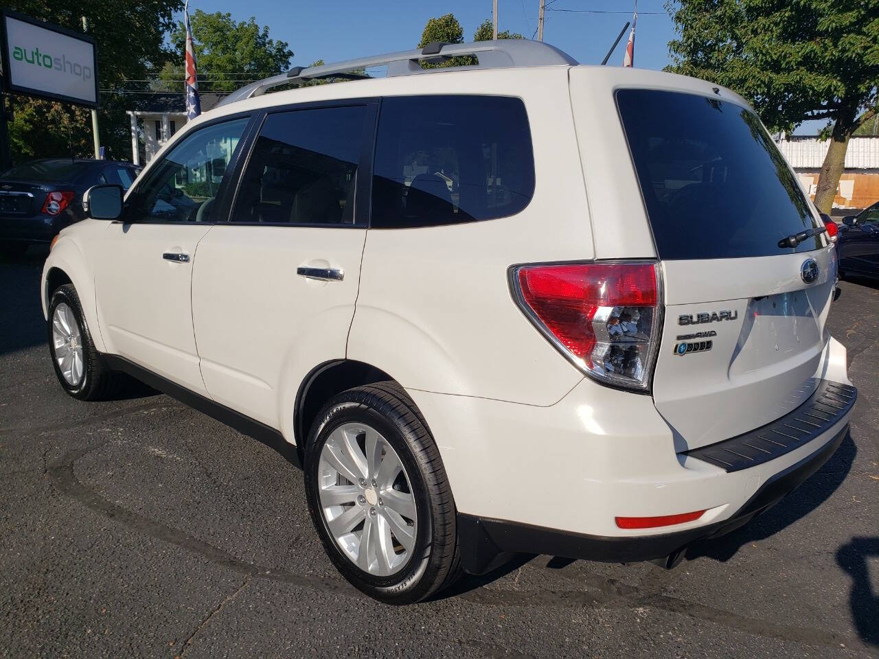 2011 Subaru Forester for sale at Auto Shop in Wyoming, MI