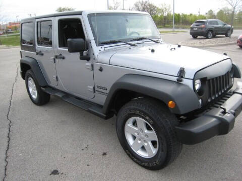 2017 Jeep Wrangler Unlimited for sale at FINNEY'S AUTO & TRUCK in Atlanta IN