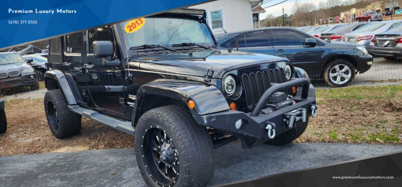 2013 Jeep Wrangler Unlimited for sale at Premium Luxury Motors in Grayson GA