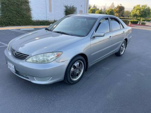 2006 Toyota Camry for sale at E and M Auto Sales in Bloomington CA