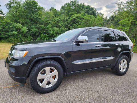 2011 Jeep Grand Cherokee for sale at Akron Auto Center in Akron OH
