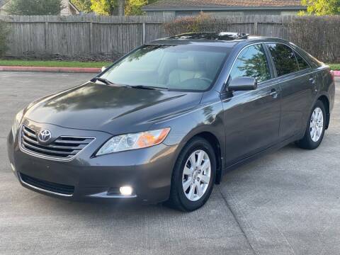 2007 Toyota Camry for sale at KM Motors LLC in Houston TX