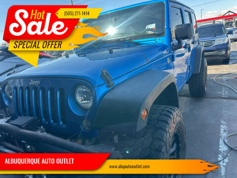 2015 Jeep Wrangler Unlimited for sale at ALBUQUERQUE AUTO OUTLET in Albuquerque NM
