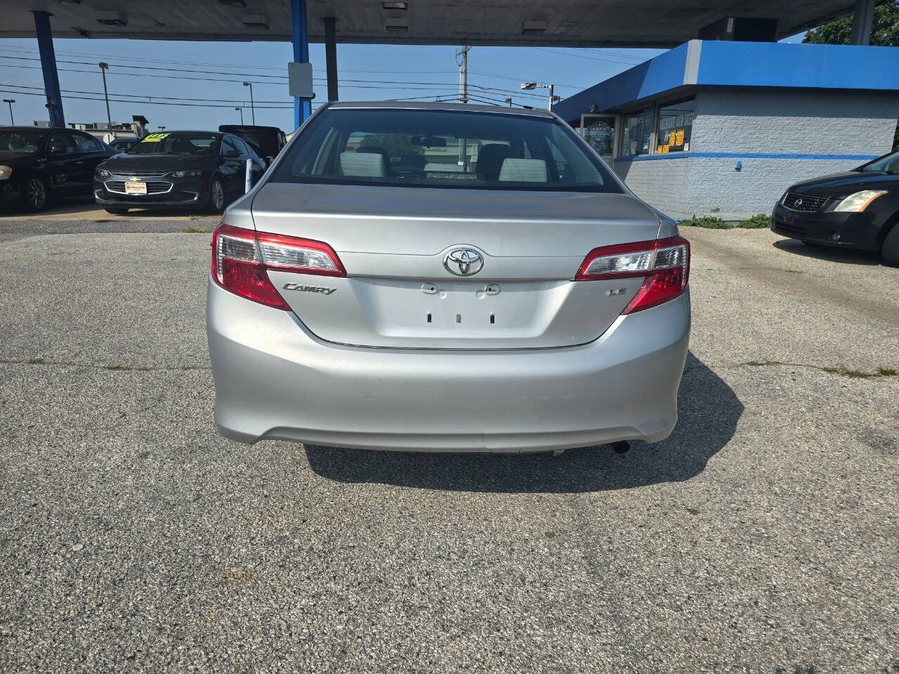 2012 Toyota Camry for sale at QUEENSGATE AUTO SALES in York, PA