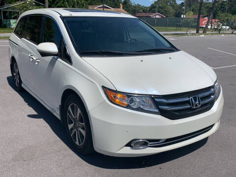 2014 Honda Odyssey for sale at Consumer Auto Credit in Tampa FL