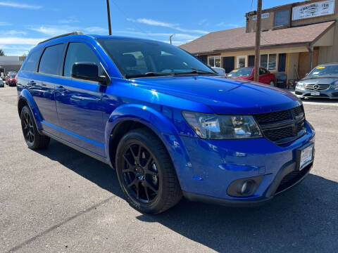 2015 Dodge Journey for sale at BERKENKOTTER MOTORS in Brighton CO