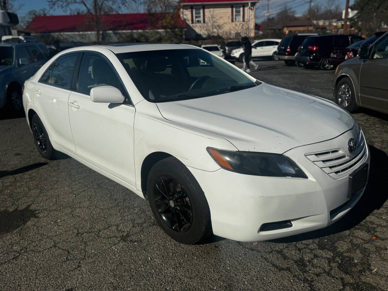 2009 Toyota Camry for sale at Walkem Autos in District Heights, MD