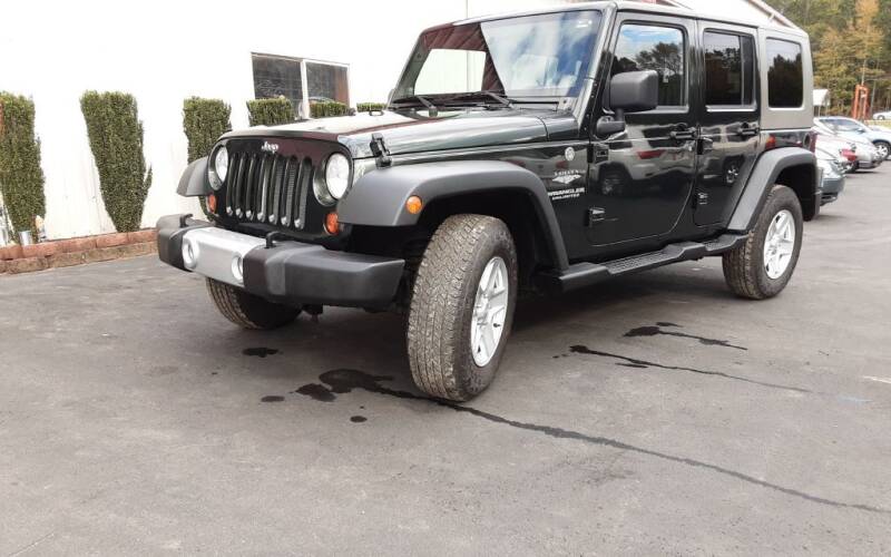 2010 Jeep Wrangler Unlimited for sale at Mathews Used Cars, Inc. in Crawford GA
