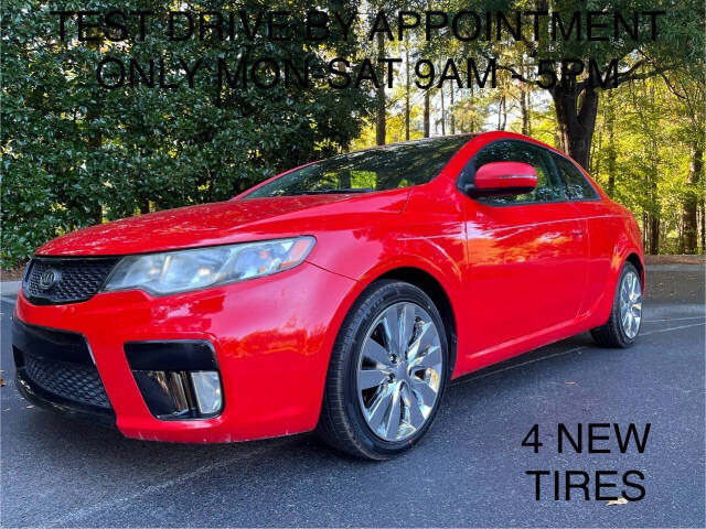 2011 Kia Forte Koup for sale at Megamotors JRD in Alpharetta, GA