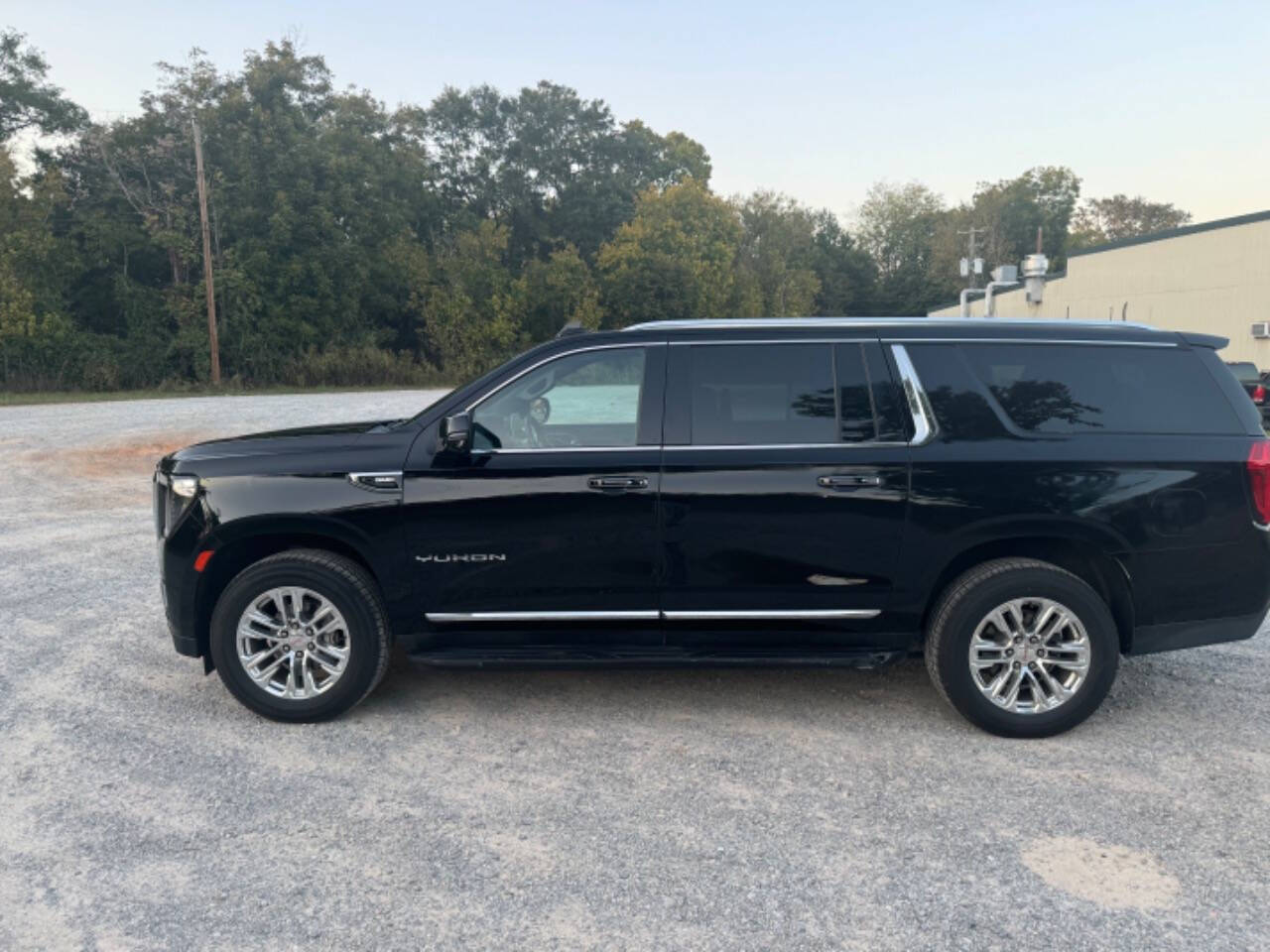 2021 GMC Yukon XL for sale at Guadalupe Auto Sales, LLC. in Jemison, AL