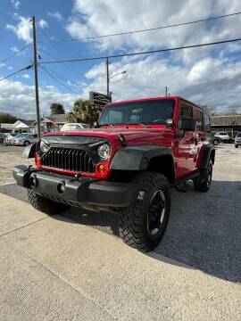 2012 Jeep Wrangler Unlimited for sale at BEST MOTORS OF FLORIDA in Orlando FL