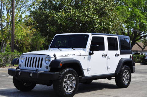 2016 Jeep Wrangler Unlimited for sale at Vision Motors, Inc. in Winter Garden FL